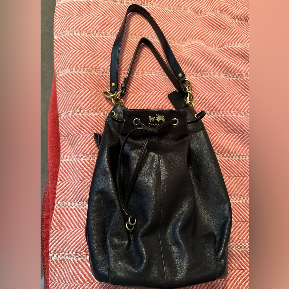 Coach black leather shoulder bag. Brand new condition, closet kept.